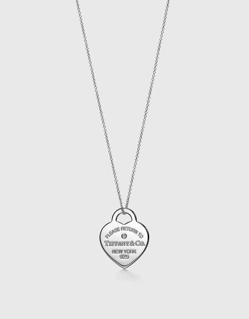 Elsa Peretti™ Open Heart pendant in 18k gold with diamonds. | Tiffany & Co.
